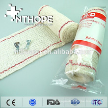 Medical elastic crepe bandage with red thread